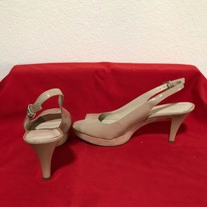 Nude patent leather heels